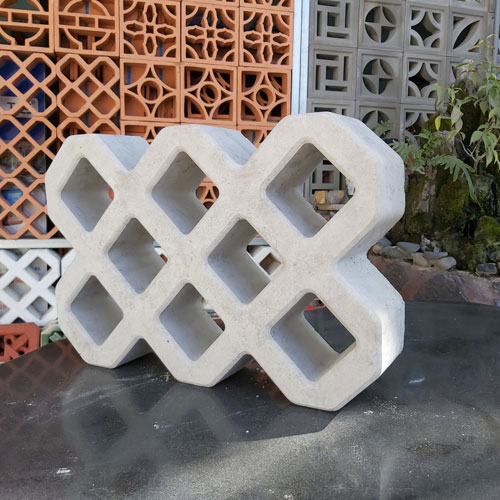 Gạch trồng cỏ 8 lỗ láng vát cạnh